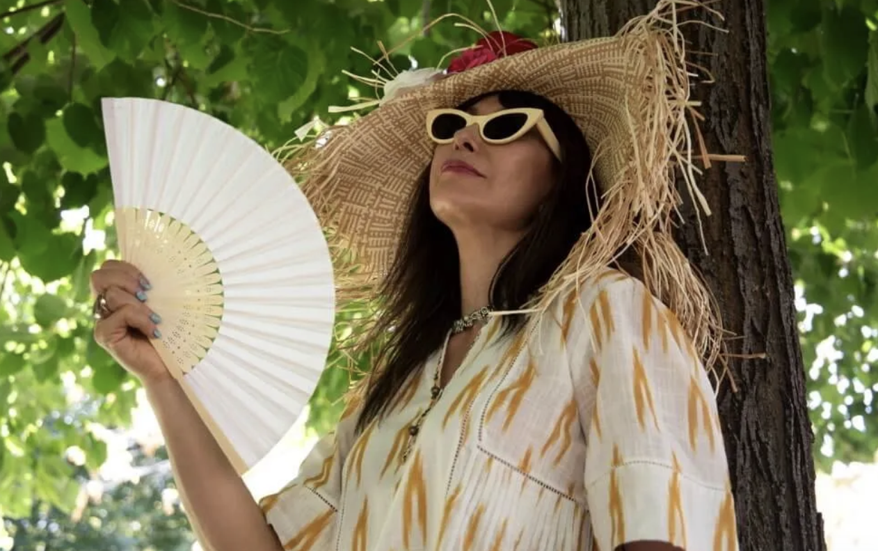 Woman with Fan~Hot Flash